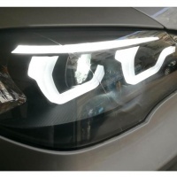2 faróis de xenônio BMW X5 E70 Angel Eyes icônicos LED 07-13 - preto